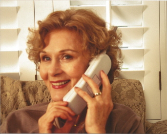 Joyce (on phone) (print ad) (web)