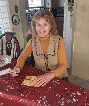 Joyce signing for a fan